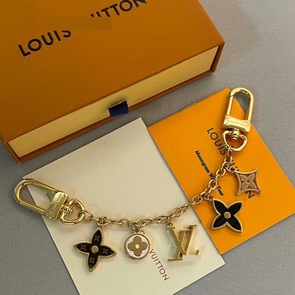Luxury fashion vintage four-leaf clover alloy sunflower keychain bag pendant accessory