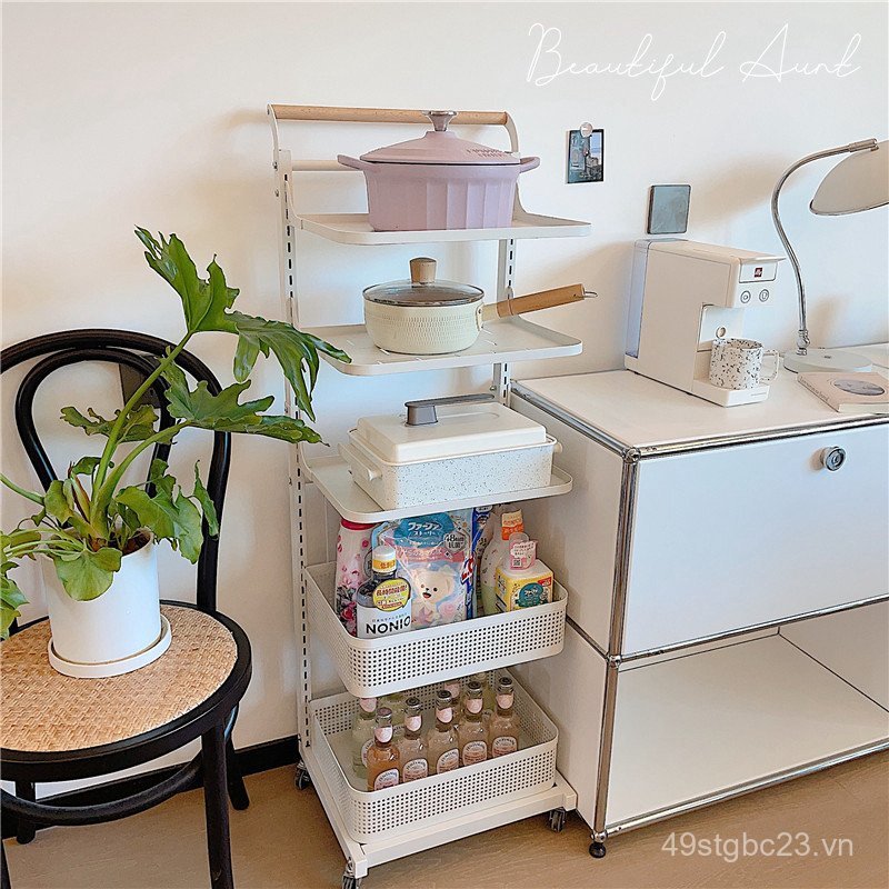 * * Cô bé xinh đẹp * Giá đựng nồi nhà bếp đơn giản Kệ nhiều lớp Giá đựng đồ di động có bánh xe đứng 