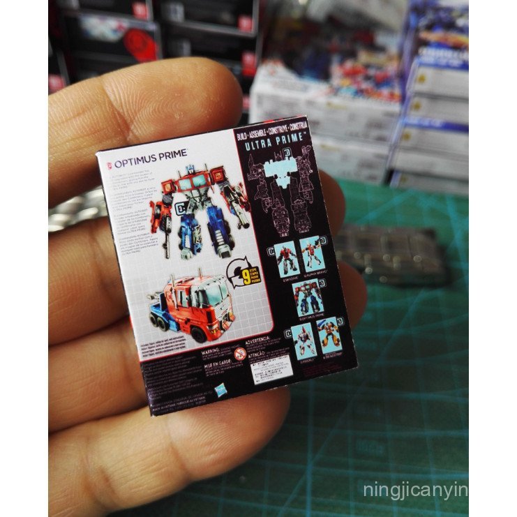 Hộp Giấy Thu Nhỏ Transformers IDW Fit War V-Class Optimus Prime 1 / 6 Bao Bì Bên Ngoài Mô Hình Giấy 