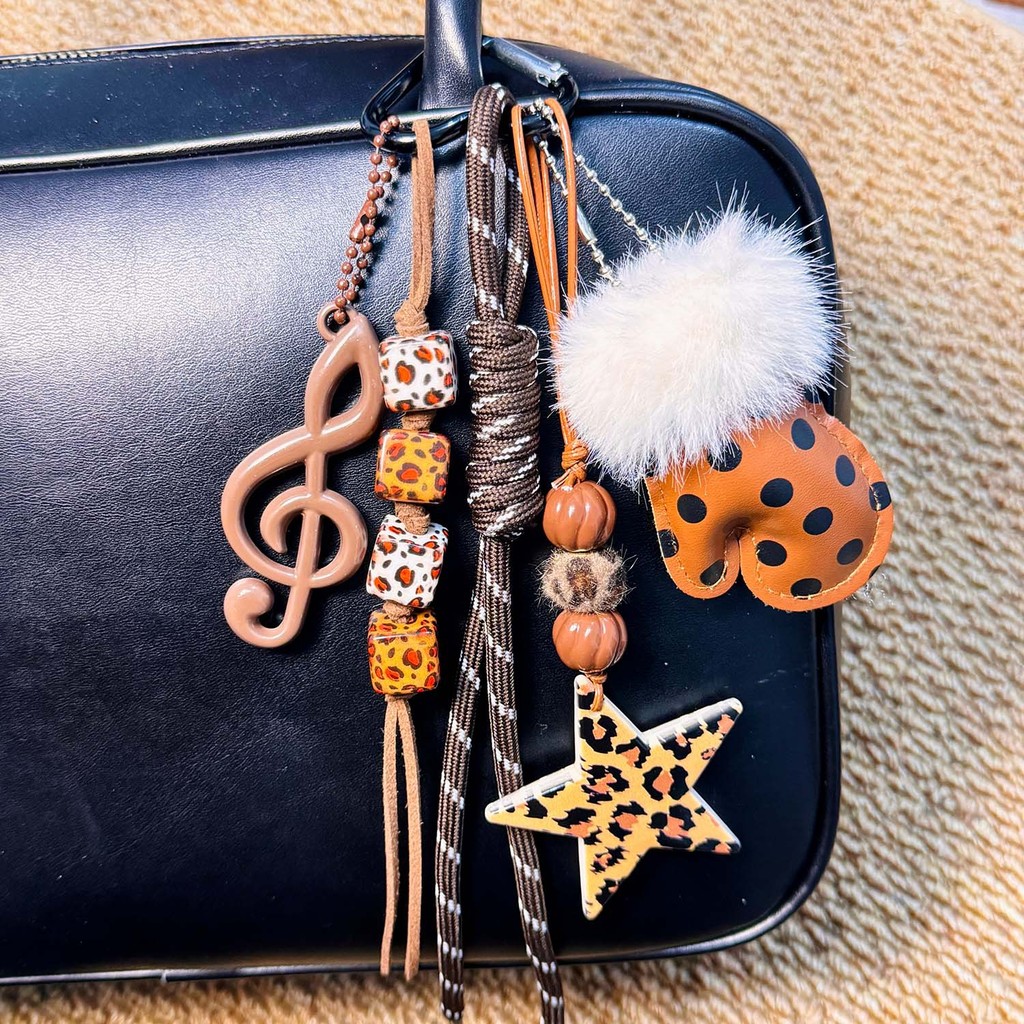 2026 New Creative Miu Series Bag Hanging Fluffy Leopard Gloves Mini Fashion Bag Package Pendant Stra