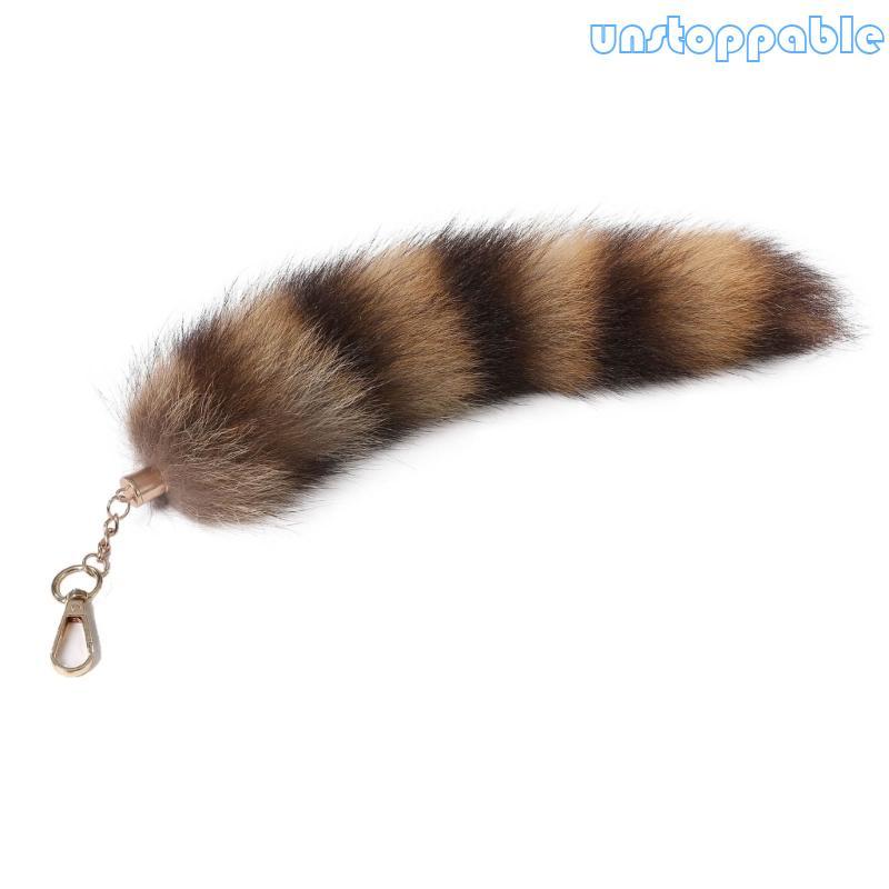 Móc khóa lông cáo raccon sang trọng với thiết kế ngọt ngào dễ thương, phù hợp cho xe và balo.