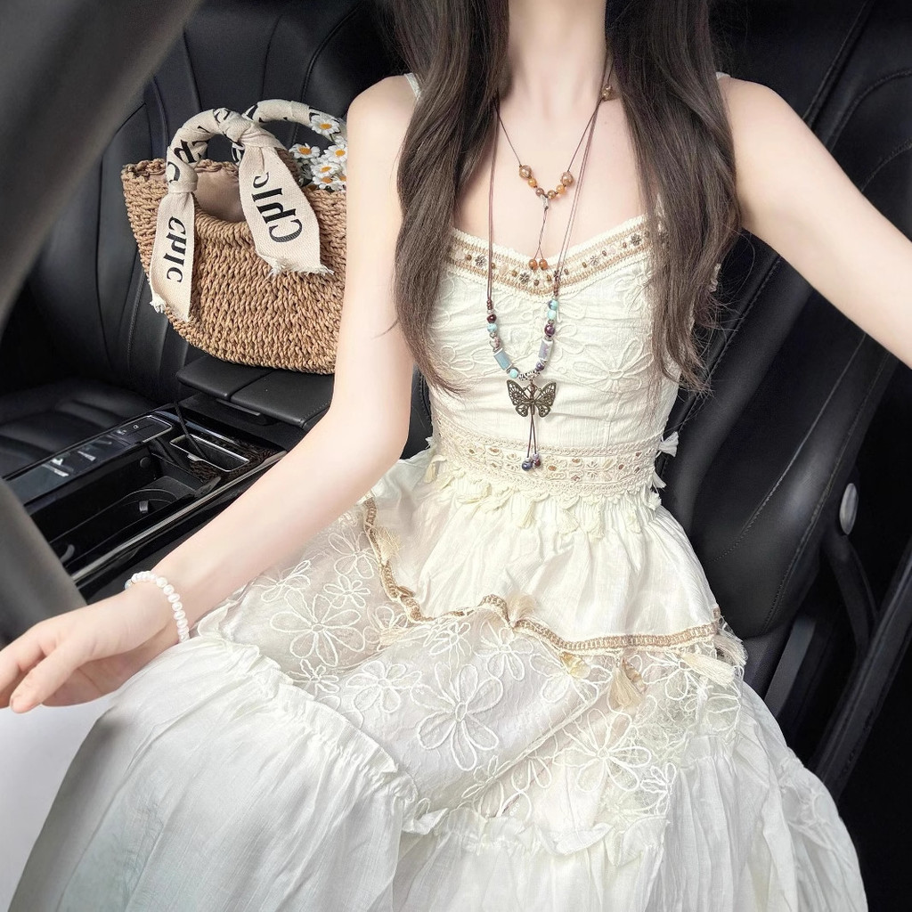 Bộ áo camisole phong cách dân tộc retro Bohemian Rhapsody và nchân váy tua rua cho nữ mùa hè mới