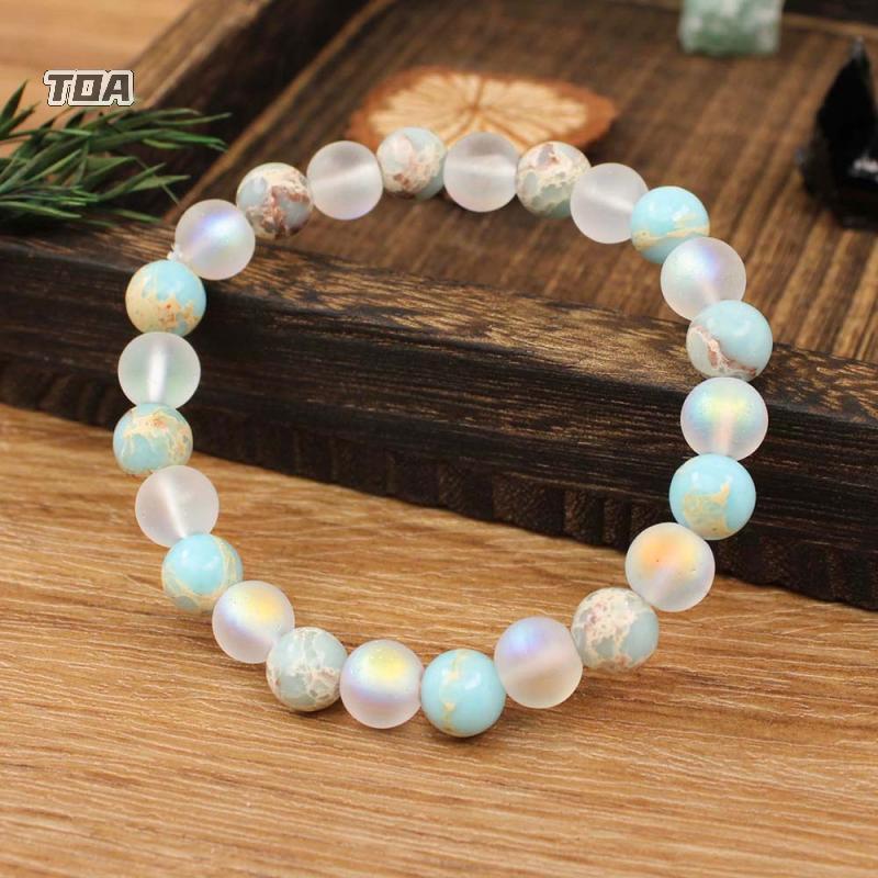 Vòng tay đính cườm thạch anh Agarwood Aura và Ocean