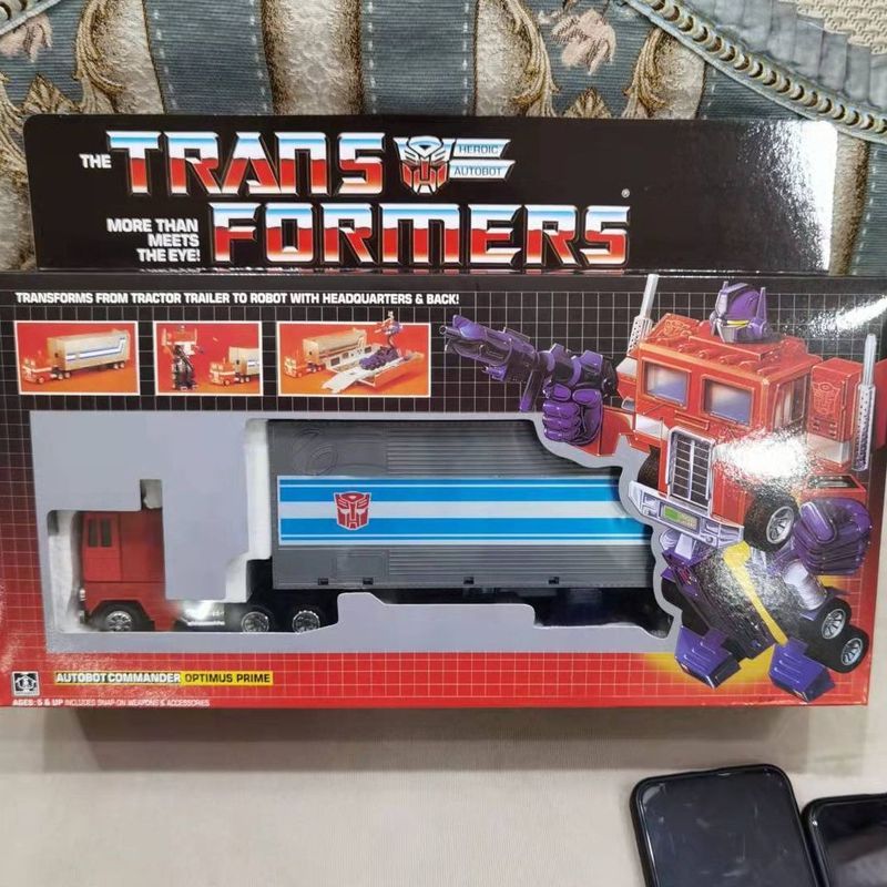 Đồ chơi biến dạng G1 Optimus Prime + Carriage G1 KO Phiên bản hoàn toàn mới chưa mở