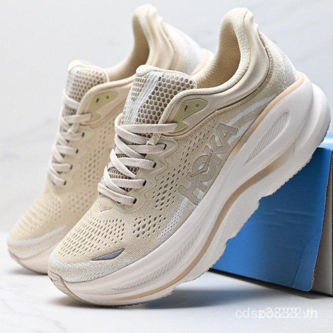 Giày chạy bộ màu be Lotto Bondi 9 được thiết kế để chống trượt và bền bỉ.