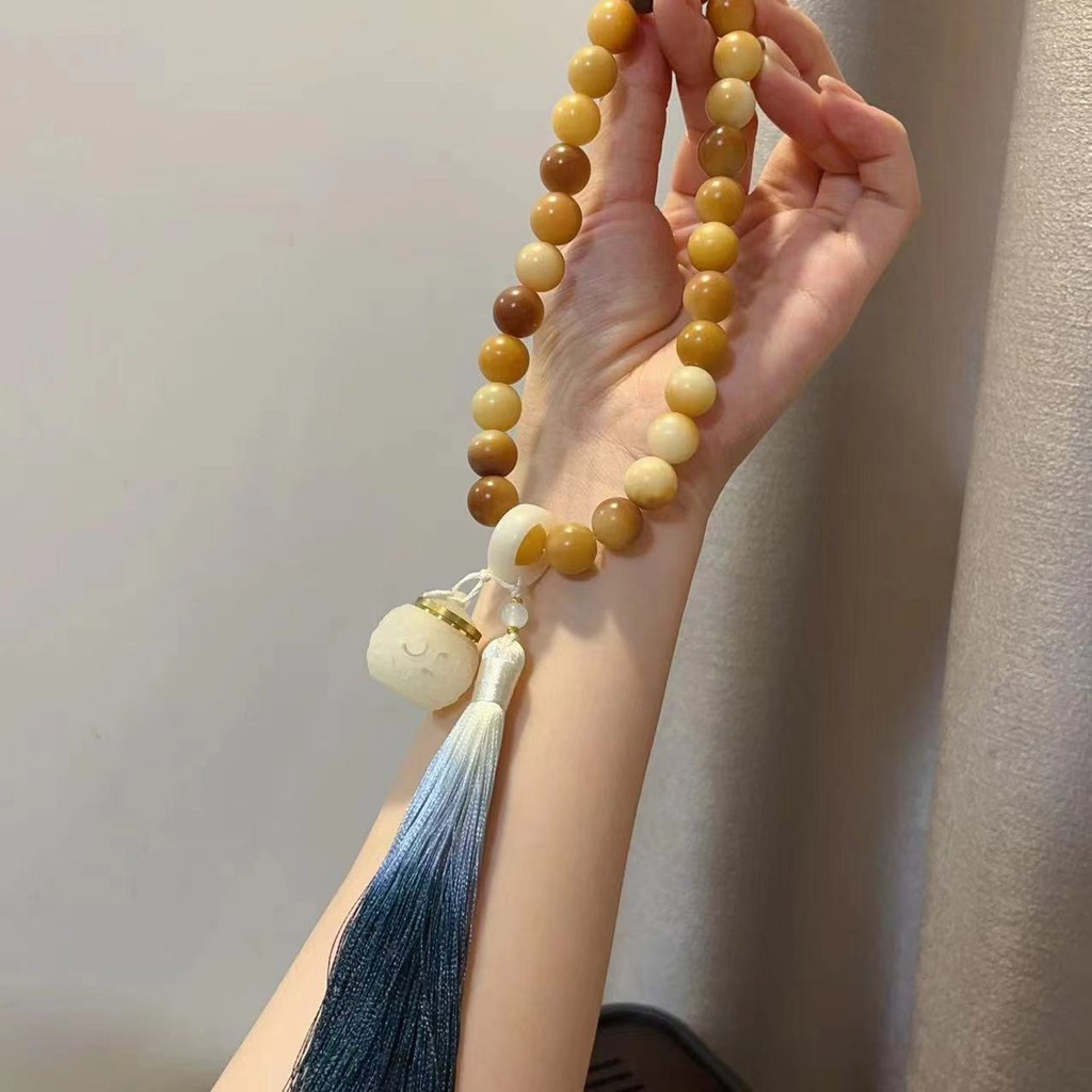 Bodhi Wangzai Móc treo xe cầm tay dòng Bun hấp nhỏ có mở rộng đá phát sáng VVZY