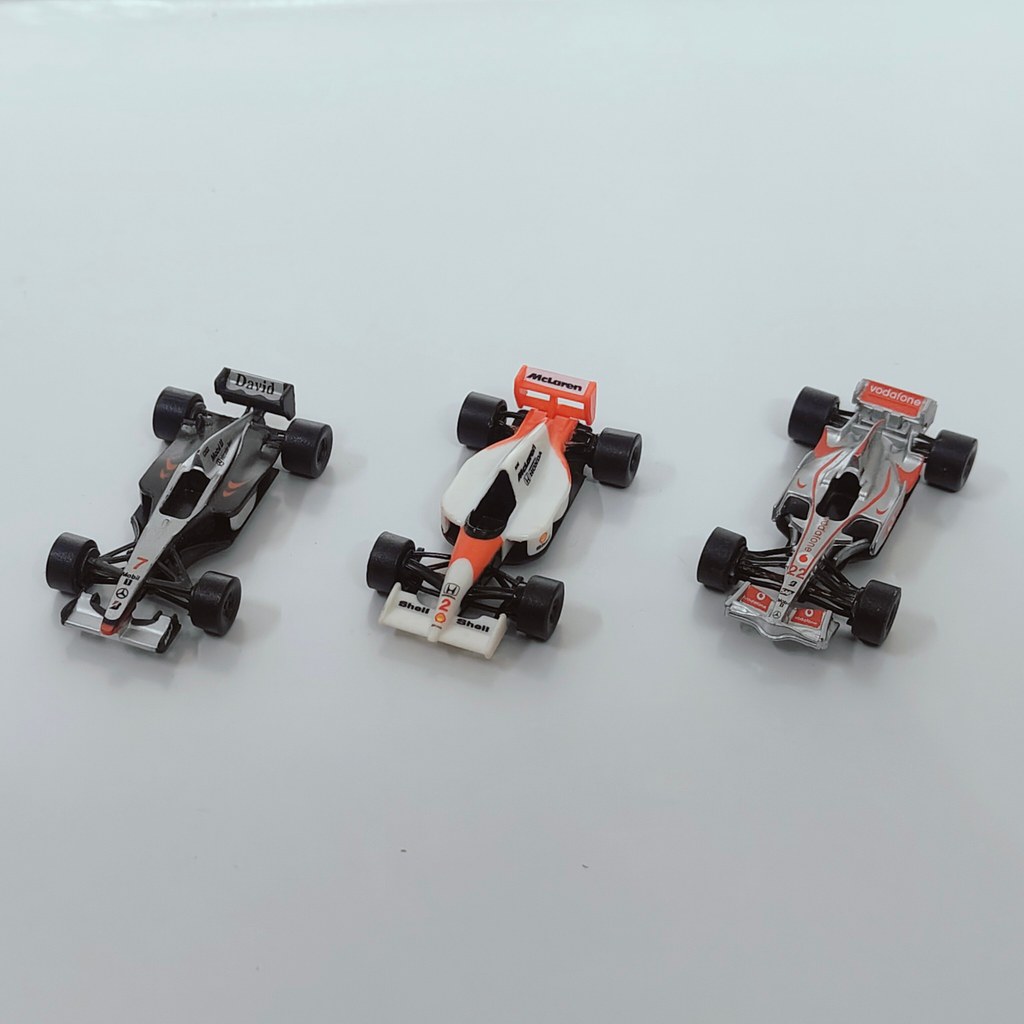 Số lượng lớn Mini F1 Racing Car Model Đồ chơi mini Mô hình ô tô Trang trí bánh xe có thể xoay