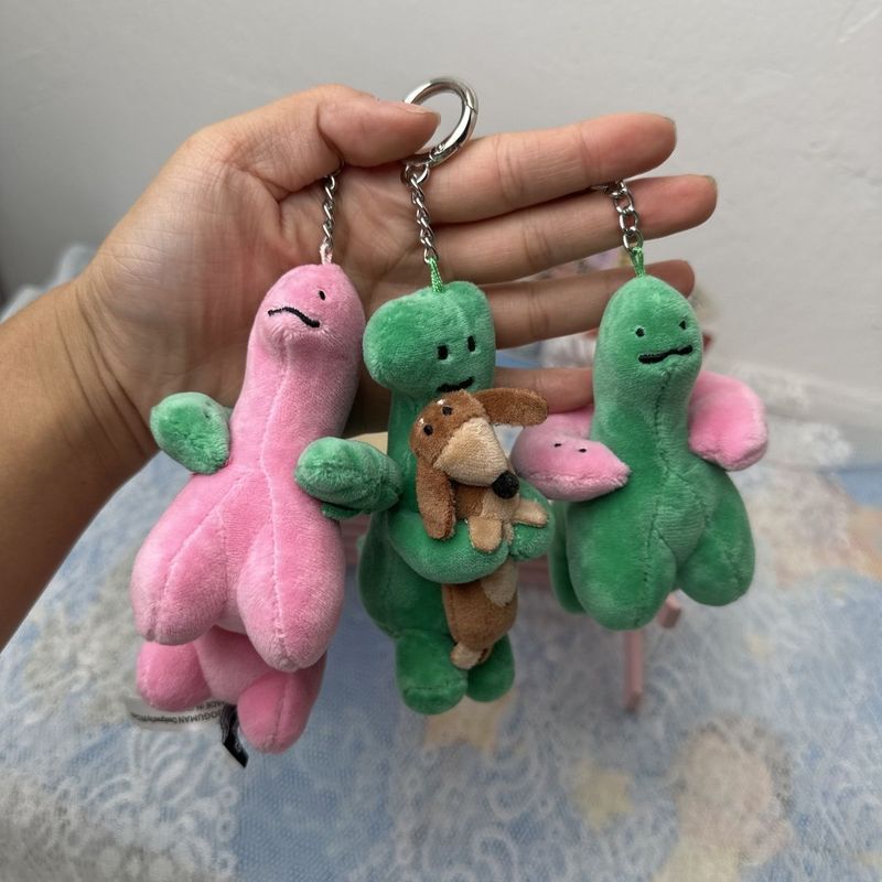 Hàn Quốc JOGUMAN STUDIO JOGUMAN Green Dinosaur Hug Puppy Móc khóa
Mặt dây chuyền hình hoạt hình O