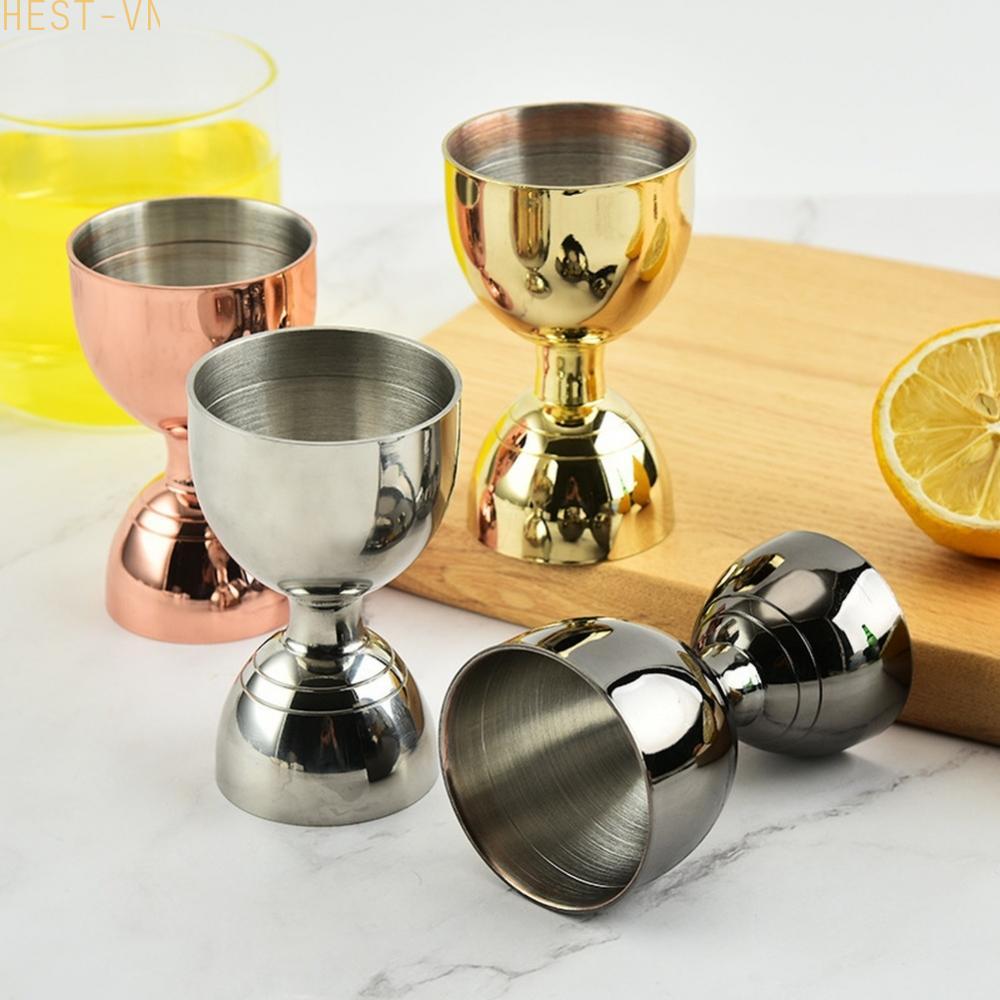 stainless steel jigger with measurement markings bartender cocktail ounce cup