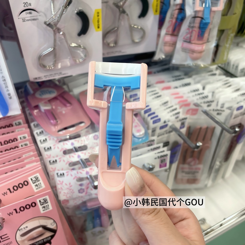 {Korea Daigou} Máy uốn mi hướng dương Daiso Daiso Daiso Hàn Quốc Uốn mi tự nhiên lâu trôi