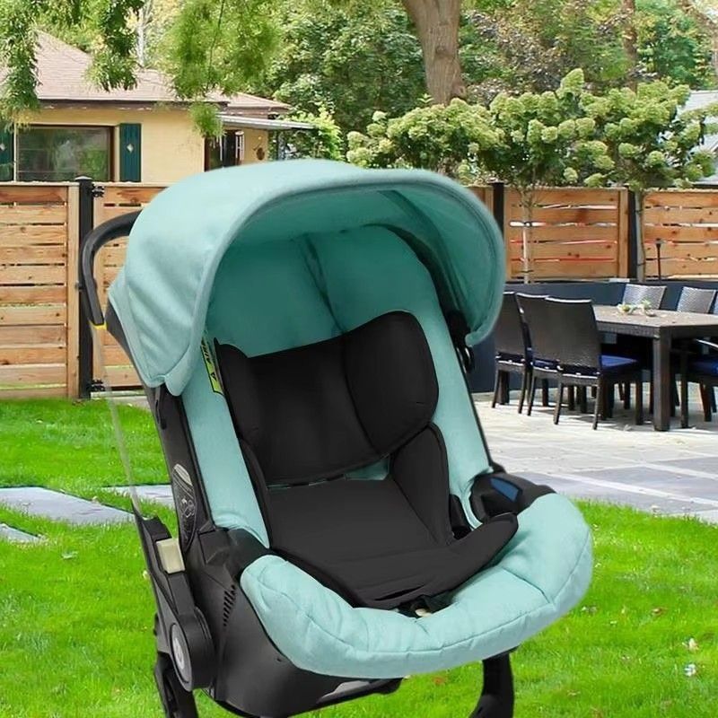 DOONA Xe đẩy trẻ em bốn trong một Giỏ đệm đệm an toàn ô tô Đệm bảo vệ Phụ kiện đa năng