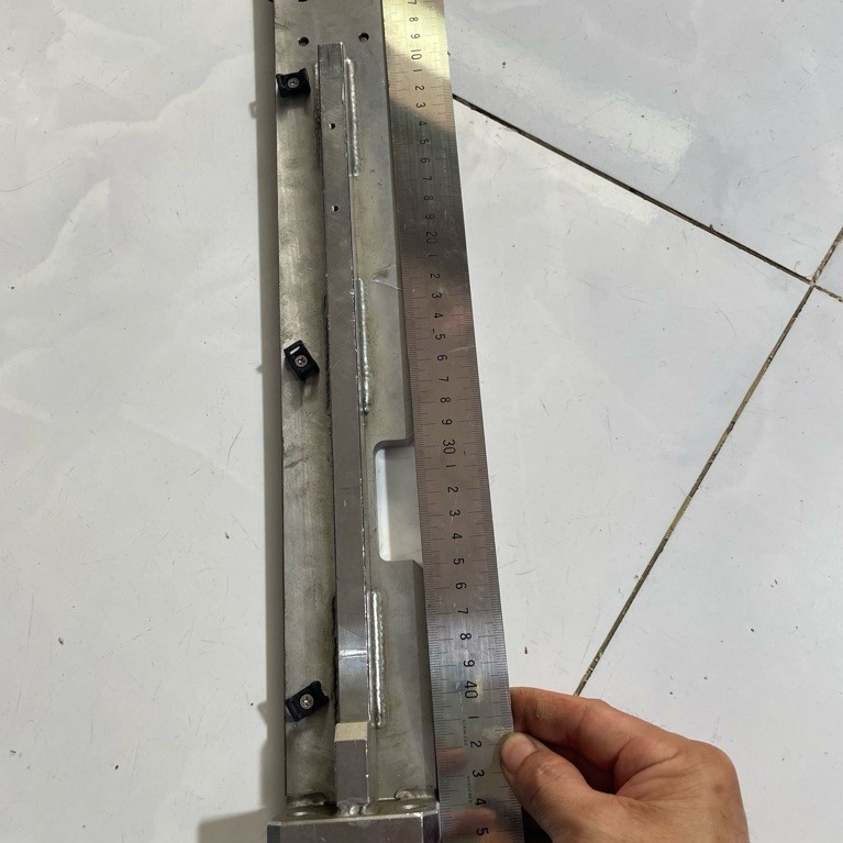 Khung ke góc thép trắng chế khung H máy hàn cell pin, CNC