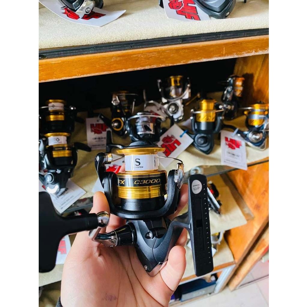 Máy cuộn dây câu kim loạiMáy Câu Đứng Shimano FX New 2019 máy fx 2500-3000-4000 chuyên lure tráp, câ