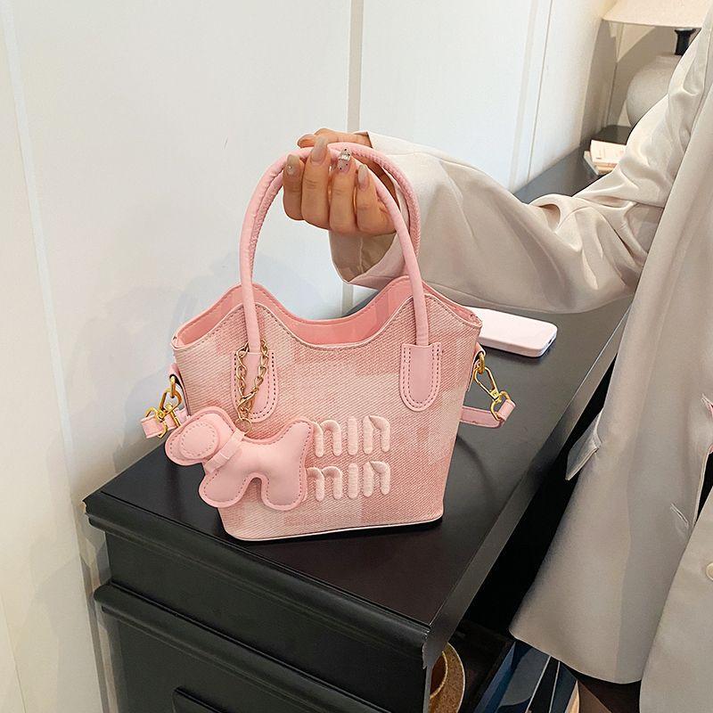 [Phong cách mới theo mùa] Preppy Soft Girl Style Puppy Mặt dây chuyền Túi xách nữ Chữ nổi Túi xách đ