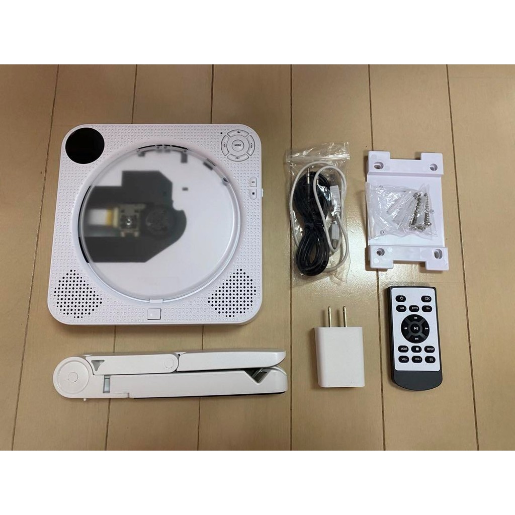 Used Portable CD player, wall-mounted and tabletop type, requires 4 AA batteries "Anti-theft measure