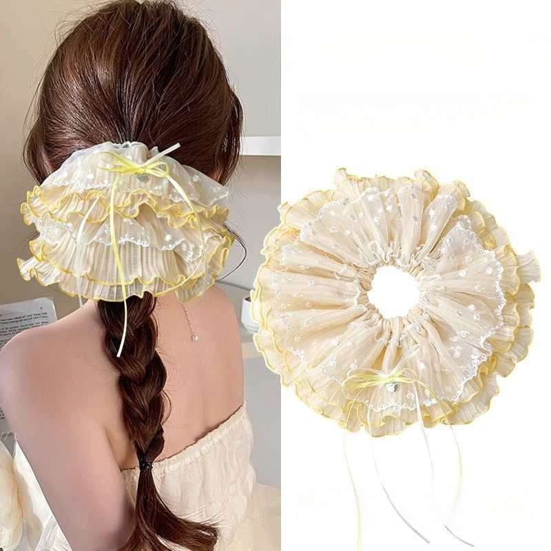 Young girl with sweet polka dot lace hairband