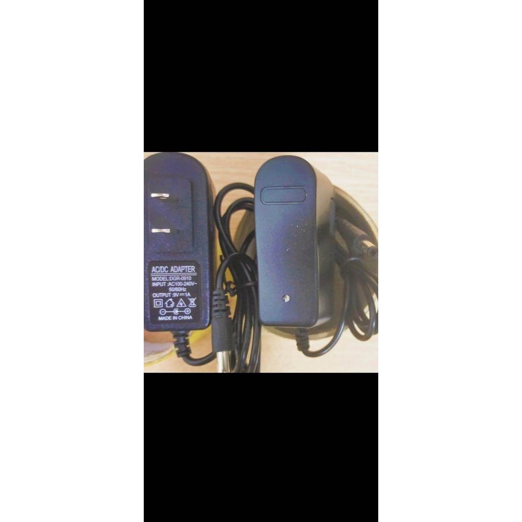 Adapter 9v1a dau lon .dung đen led va quang cao