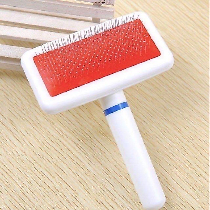 lược chải lông chấm bi cho chó mèo