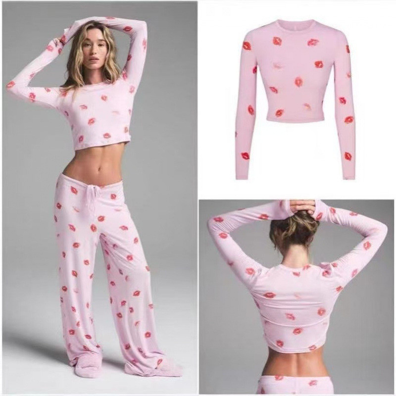 SKIMS SLEEP Lip print loungewear pajama set with long sleeves, long pants, and camisole shorts set