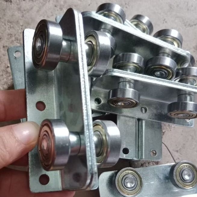 phụ kiện cửa sắt, bánh xe lùa chịu lực, chịu tải 4 bi, chạy máng ( ray treo) các cỡ