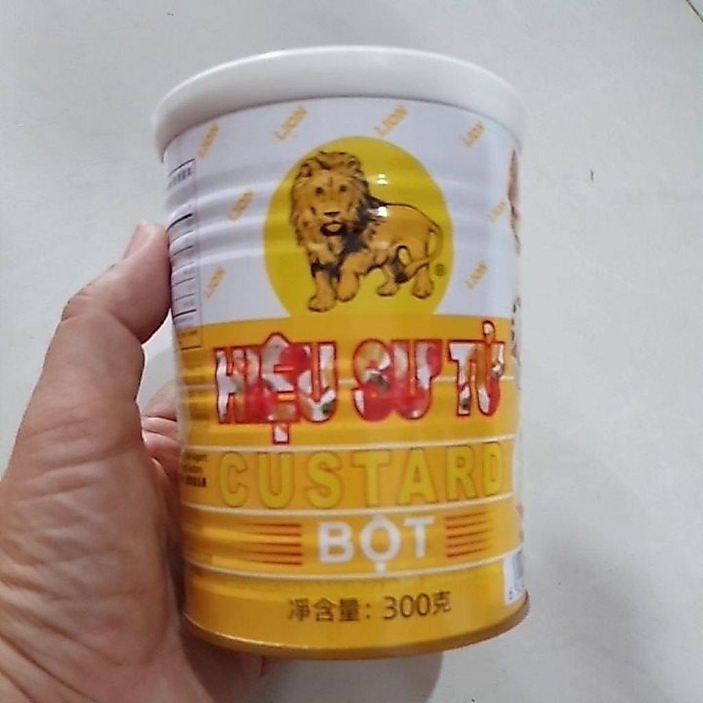 (DATE: T09//2027) BỘT CUSTARD, HIỆU SƯ TỬ (LION CUSTARD POWDER), LON 300g