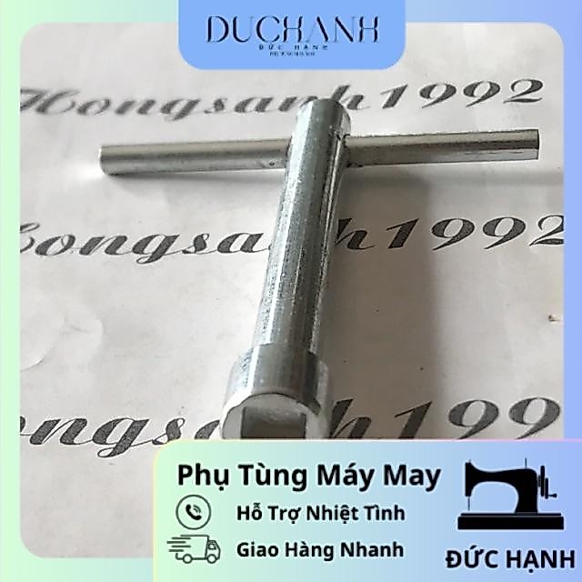 Khoá mở dao máy cắt đứng