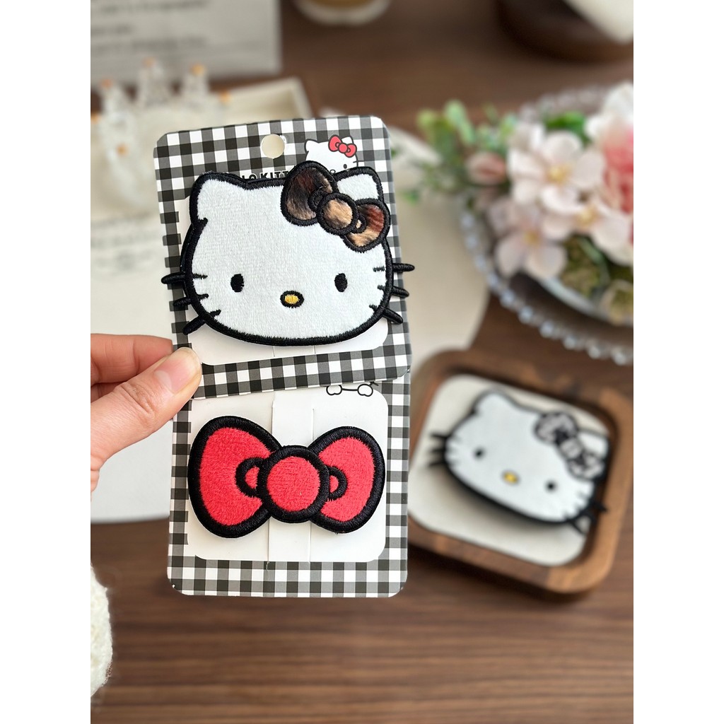 Chính Hãng Hello Kitty Da Báo In Hello Kitty Thêu BB Kẹp Nơ Cô Gái Dễ Thương Nổ Bên Kẹp Tóc
