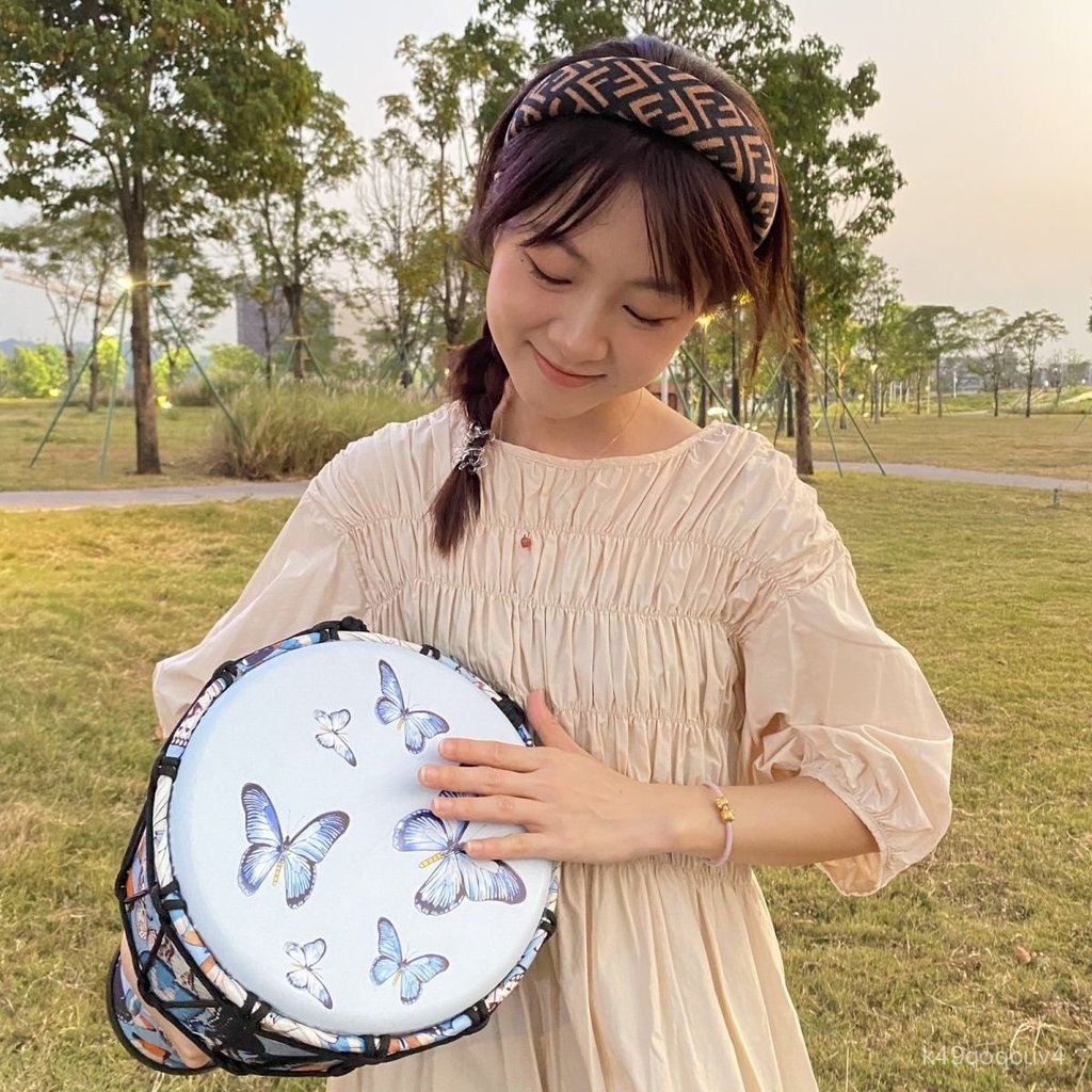 Trống tay djembe 10 inch hoa bướm xanh cho trẻ em người lớn tập chơi âm thanh vang sáng