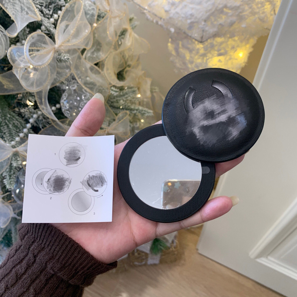 1FQW Rotating makeup mirror with a stylish leather finish, a fashionable compact mirror for going ou