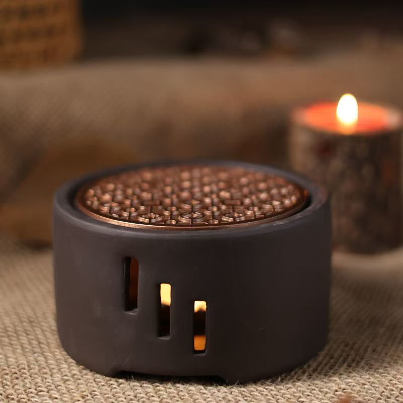 Sản phẩm mới Ấm trà gốm sứ có sẵn Lễ trà Kung Fu với miếng đệm kim loại Đế nến gốm ấm trà xung quanh