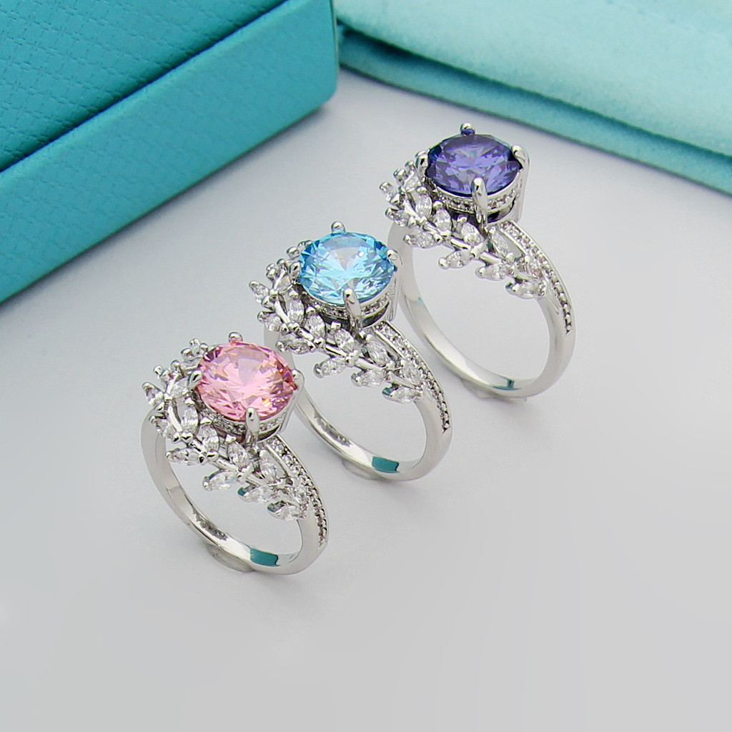 7PZM Pink and blue ring with diamonds, vine motif, and olive tree diamond round ring t Letter Eye