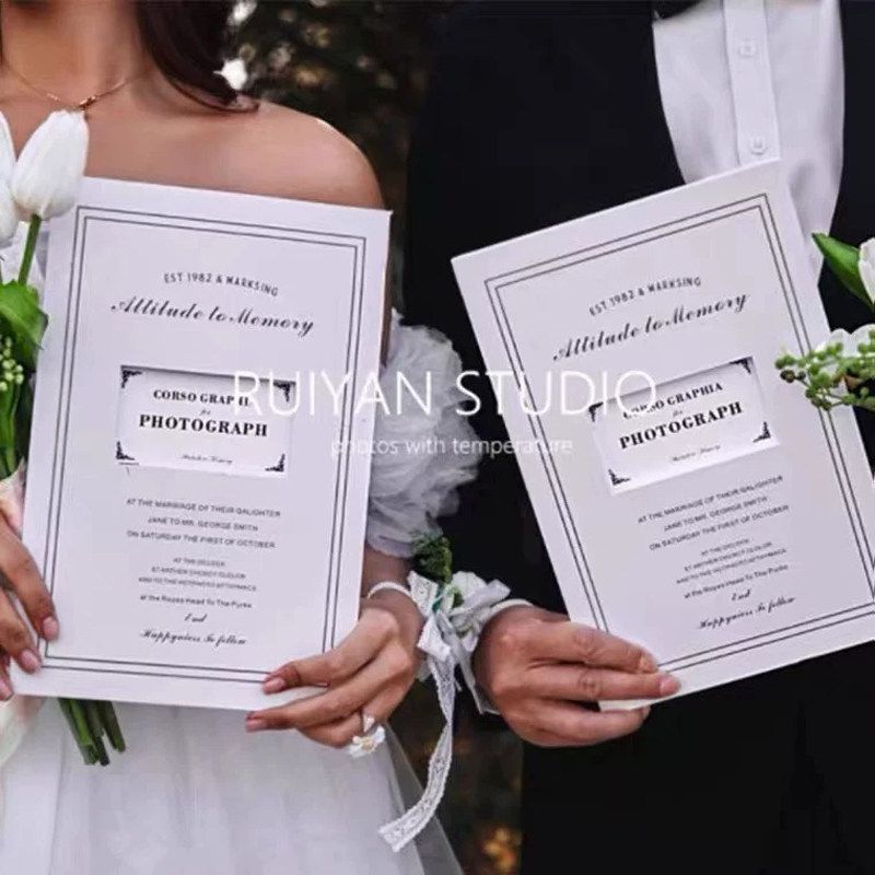 Realistic wedding props paper English rings12y Hand-hold certificate photography, newspaper-style ha