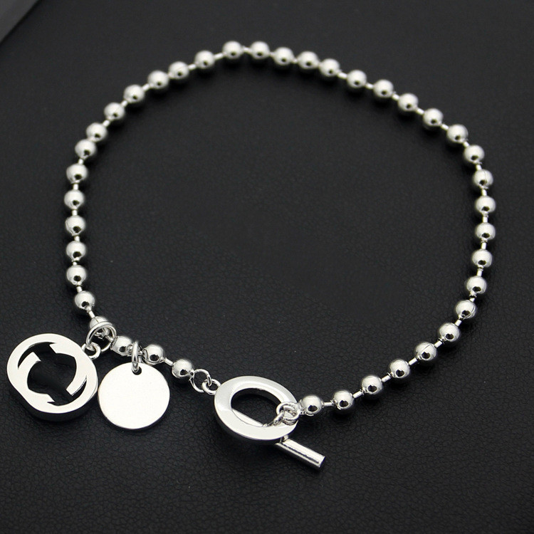 UIEX Clasp bracelet for men and women, couple's bracelet with round beads and hollow design g Letter