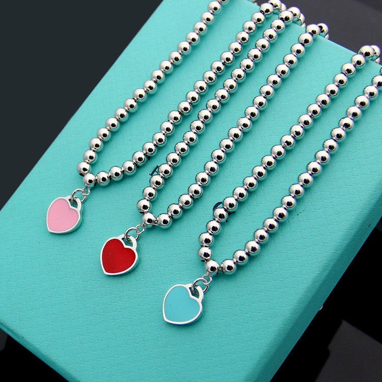 KXIL Round bead heart-shaped necklace in single pink and blue with peach oil drop heart t Heart neck