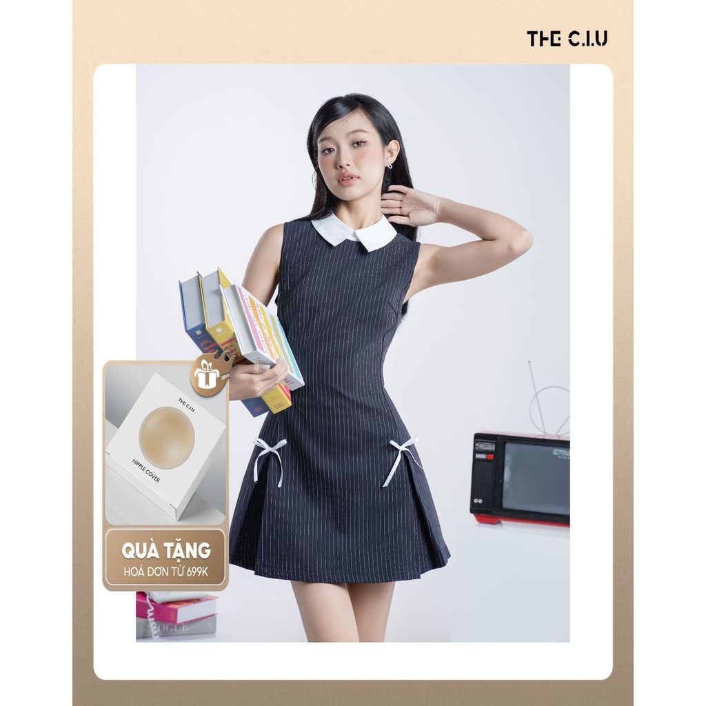 Đầm nữ cổ sơ mi trắng phối nơ THE C.I.U, đầm không tay form xòe nhẹ chất cotton sọc thanh lịch – Aurora Dress