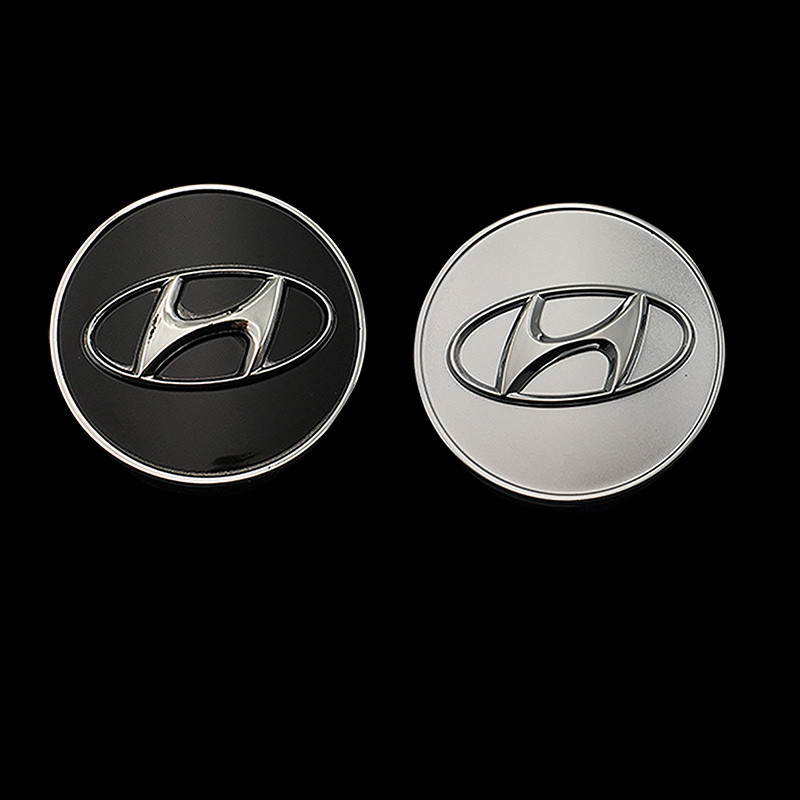 Thích hợp cho 2009 11 Mẫu Cũ Hyundai IX35 Mới Singa Tushengsuo Tám Lốp Xe Trung Tâm Vỏ Xe Ô Tô Logo