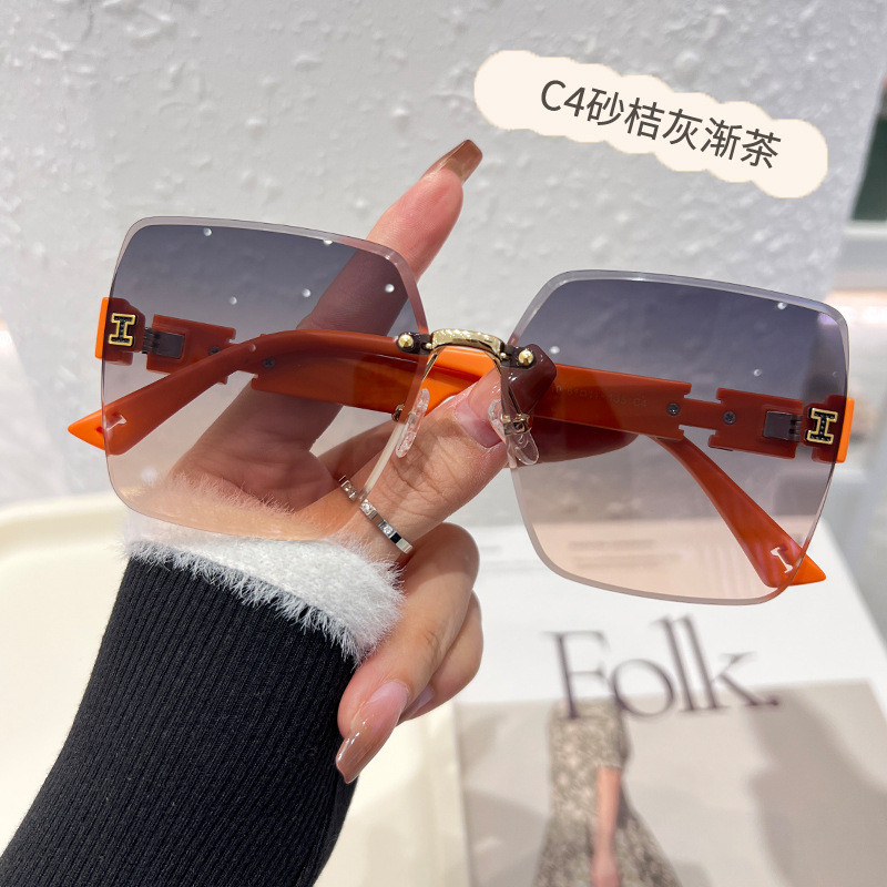 Kính râm thời trang không khung / Kính râm nữ Instagram Kính râm du lịch ngoài trời chống tia cực tí