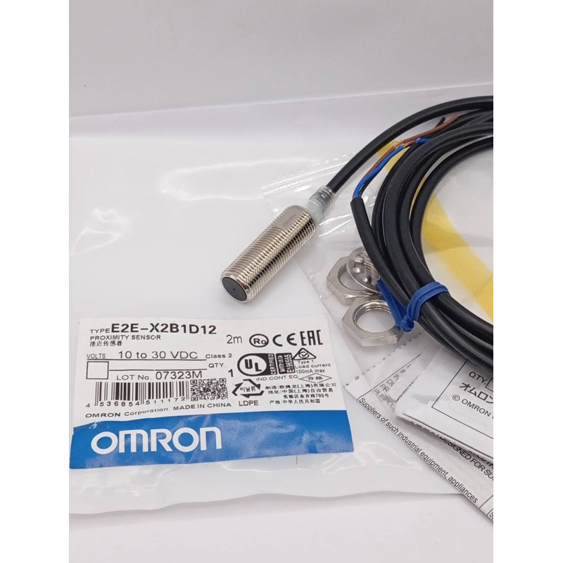 Xác thực CẢM BIẾN PROXIMITY E2E-X2C112 10 đến 30 VDC Sản phẩm được chụp ảnh từ công việc thực tế Tay