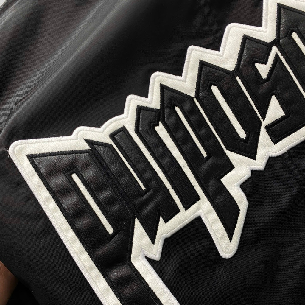 Áo khoác bomber gió nam nữ PB đen thêu chữ da Purpose Tour lưng phối túi khoá tay trần bông 3 lớp