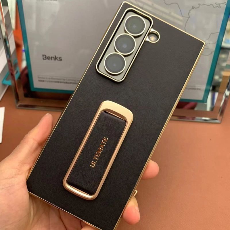 Thích hợp cho Samsung w25 Heart Series World Folding Phone Case Da trơn Dây đeo cổ tay Giá đỡ xoay W