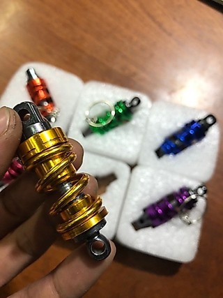 Móc khoá xe hình phuộc CNC