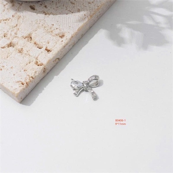 Set 2 charm đính móng nơ A28