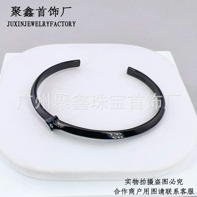 Dora bracelet S925Pure silver black sparkling four-pointed star open bracelet, fashionable and light