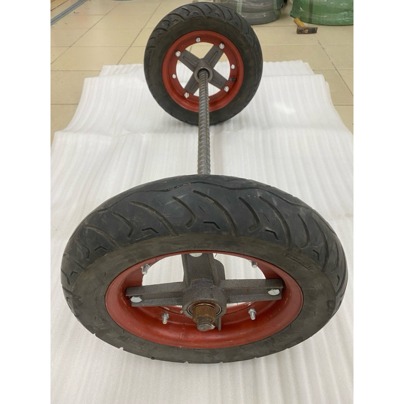 Bộ cốt trục bánh xe rùa mai ơ gang đúc, gồm 1 trục phi 28, đôi bánh xe rùa 90/100-10 đường kính bánh
