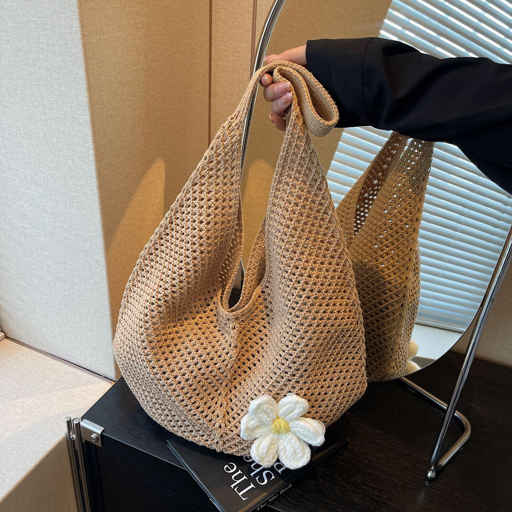 Mùa hè đi biển kỳ nghỉ bãi biển dệt túi đeo vai nữ 2026 mẫu mới dung tích lớn hoa sợi bông rỗng túi 