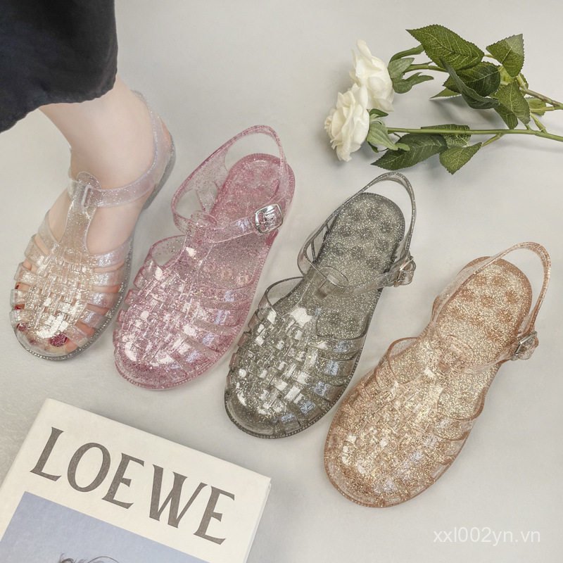 Phong Cách Mới Pha Lê La Mã Dép Lỗ Giày Mùa Hè Đế Bằng Rỗng Dép Thạch La Mã Dép Baotou Dép Nữ 5UOD