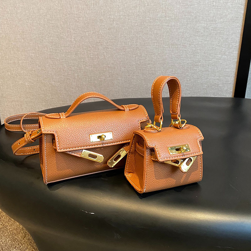 Hàng sẵn có 19 * 7 * 11CM Mini Trẻ Em Kelly Túi Nữ Phiên Bản Hàn Quốc Hợp Thời Trang Son Môi Cho Cha