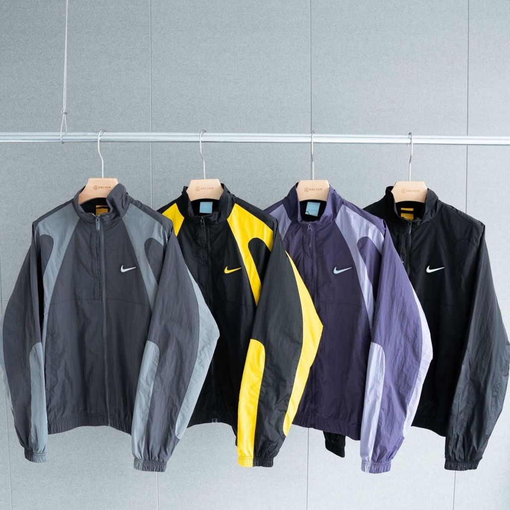 Áo khoác cổ đứng màu tương phản NOCTA có thương hiệu Drake