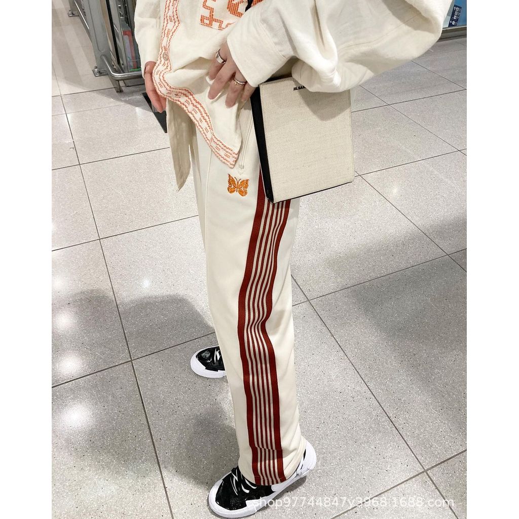 HRET Needles track Joint Name STUDIOUS Loose-fitting high street fashion unisex pants in apricot col