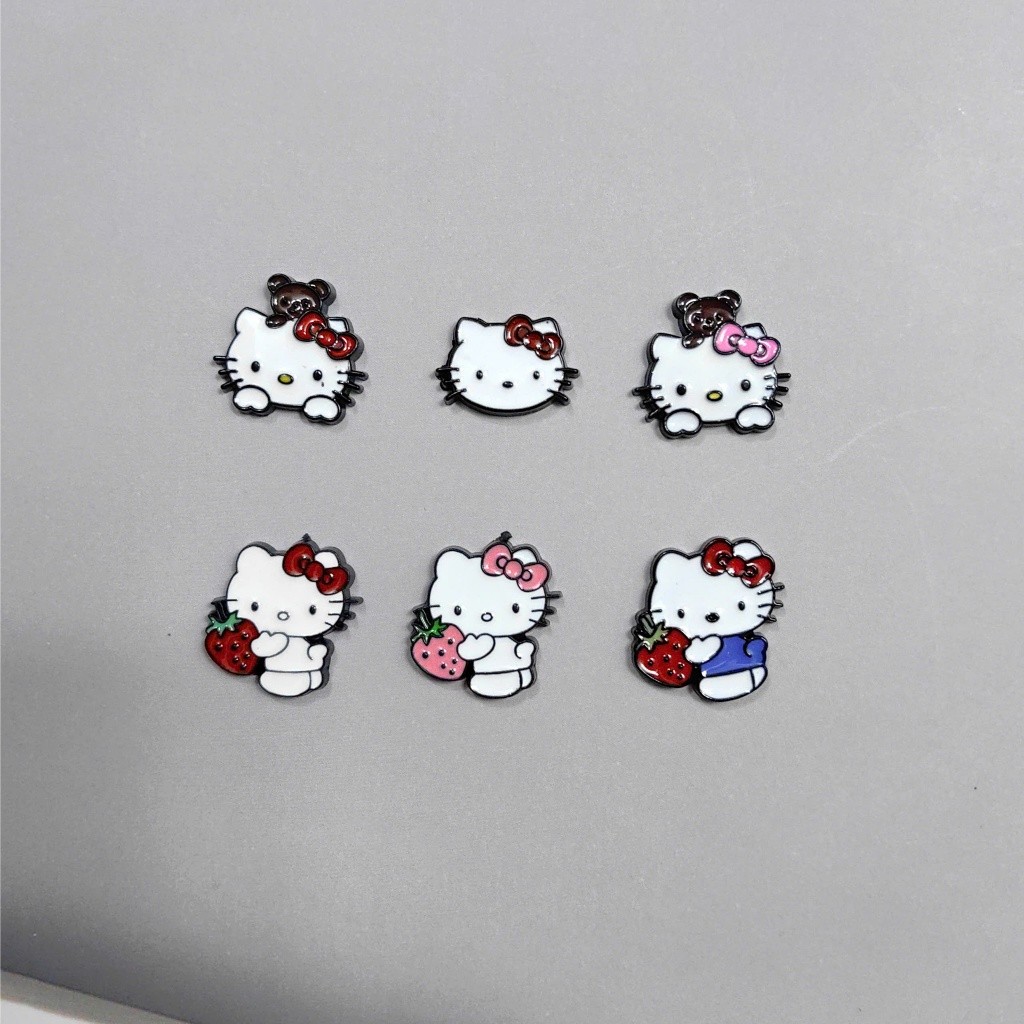 Set Charm Hello Kitty & Dâu Tây Cute – Kitty Nơ Đỏ Nơ Hồng Ôm Dâu, Charm Gắn Dép DIY Ngộ Nghĩnh